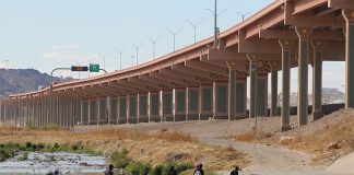 A group of migrants crosses the Rio Grande from Ciudad Juárez to enter the U.S. in March.
