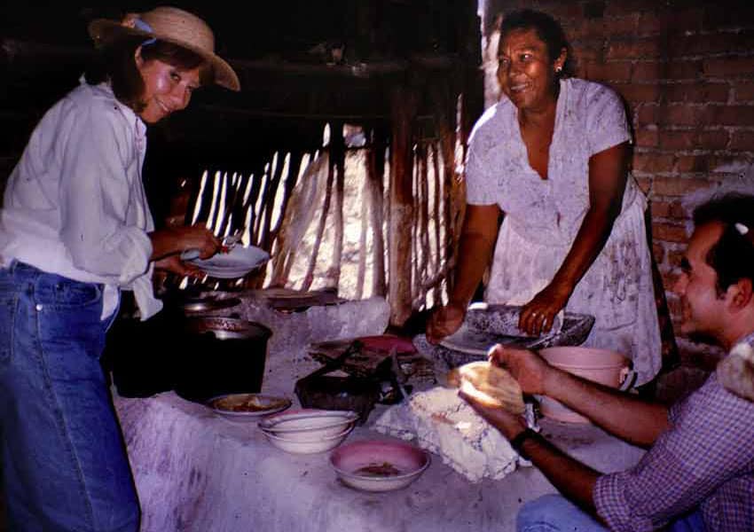 Mexican woman preparing food for guests