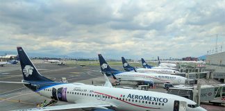 Aeromexico's Boeing 737s lined up at the gates of the international terminal of the Mexico City International Airport (AICM).