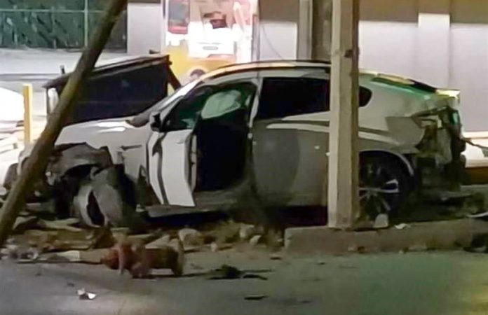 Crashed car of fugitive gang leader Ernesto Alberto Pinon de la Cruz, after he attempted to flee authorities in Juarez, Mexico