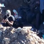 Alleged Sinaloa Cartel members on the Mexico-U.S. border as shown in a video recently broadcast on the Newsmax channel.