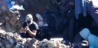 Alleged Sinaloa Cartel members on the Mexico-U.S. border as shown in a video recently broadcast on the Newsmax channel.