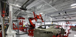 A robot in a Tesla vehicle factory