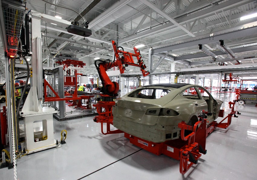 A robot in a Tesla vehicle factory