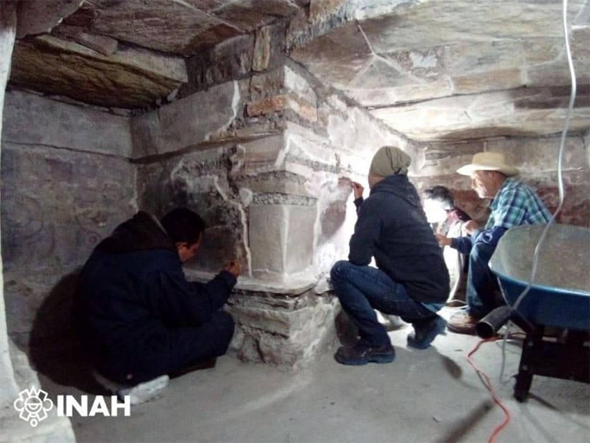 INAH archaeologists restore murals in one of the tombs.