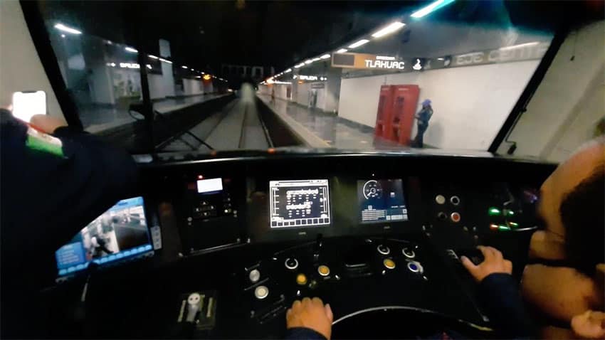 A Metro driver arrives at Tlahuac station of Line 12 during a test run prior to Sunday's opening.