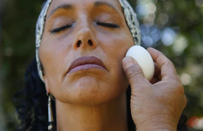 traditional Mexican ritual cleansing with raw egg