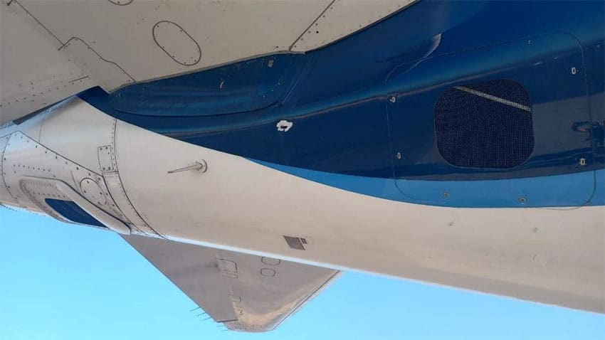 The flight was canceled after the bullet pierced the fuselage of the airplane.