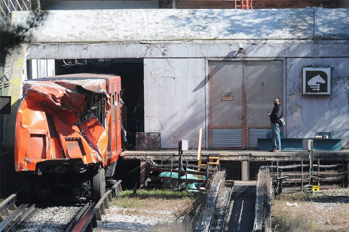 Technical crews pulled the damage train cars from the Metro tunnels on Sunday.
