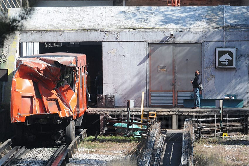 Technical crews pulled the damage train cars from the Metro tunnels on Sunday.
