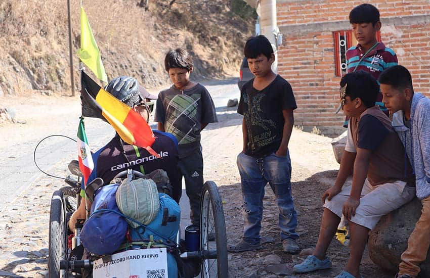 Handbiker Michiel Desmet near Lake Chapala in Michoacan.
