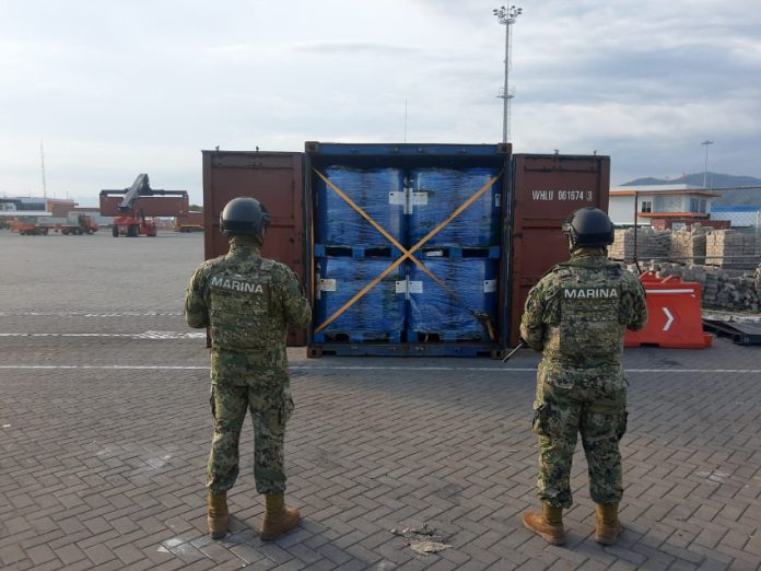 Mexican marines looking at a shipment