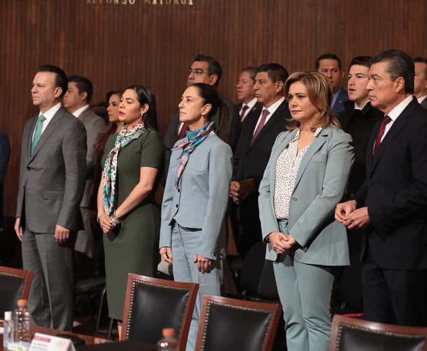 Mexico City Mayor Claudia Sheinbaum, in multicolored scarf, at anniversary celebration of Mexico's 1917 constitution in Queretaro