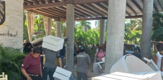 Workers, guests and furniture were thrown out of the hotel Coco Unlimited, before they struck a deal with prosecutors and were allowed to return.