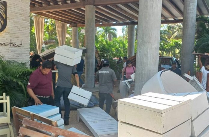 Workers, guests and furniture were thrown out of the hotel Coco Unlimited, before they struck a deal with prosecutors and were allowed to return.