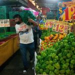 Man shopping in Mexico vendor market