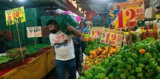 Man shopping in Mexico vendor market