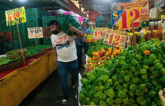 Man shopping in Mexico vendor market