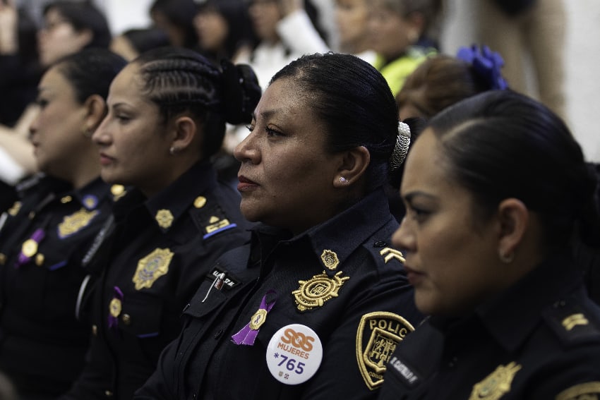 Policewomen at security dialogue with activists