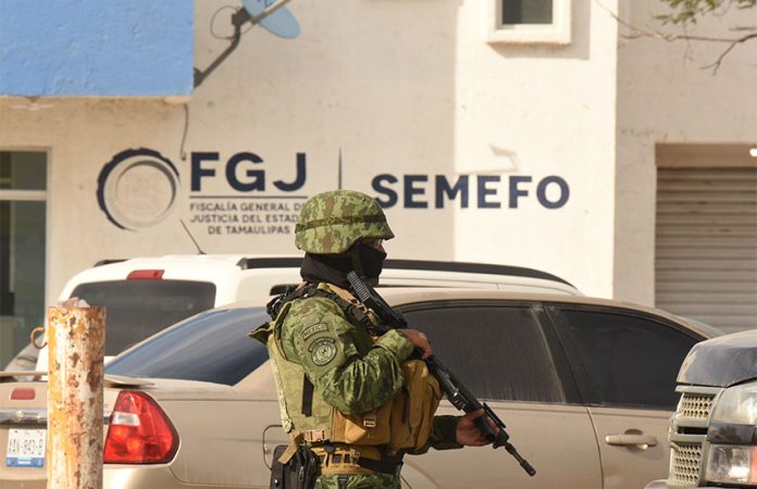 Soldier guarding building in Matamoros where Shaeed Woodward and Zindell Brown