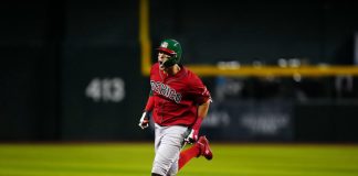 Meneses celebrates as he hits a second home run