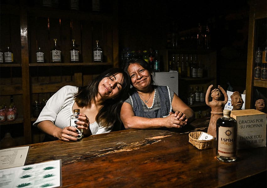 Mezcal maker Jessica Hernandez, left, with her mother, right