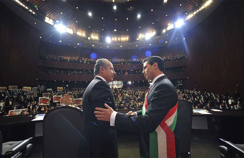 Outgoing Mexican president Felipe Calderon with incoming president Enrique Pena Nieto