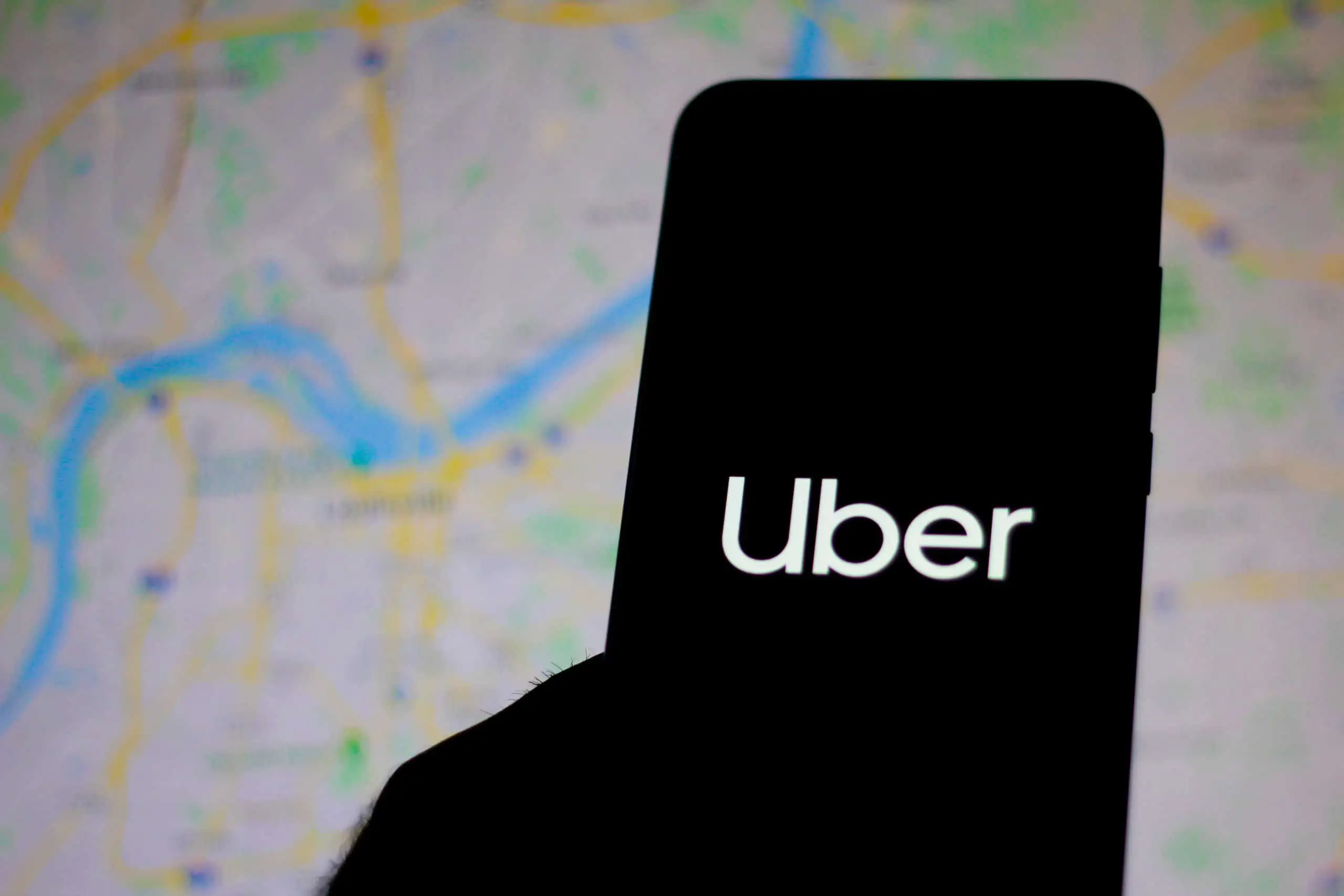 Logging in to Uber on a phone.