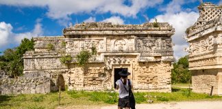 Woman looking at Chichén Itzá ruins in Yucatán