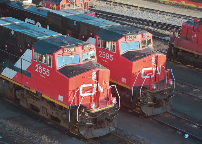 Two Canadian National railroad trains in Canada.
