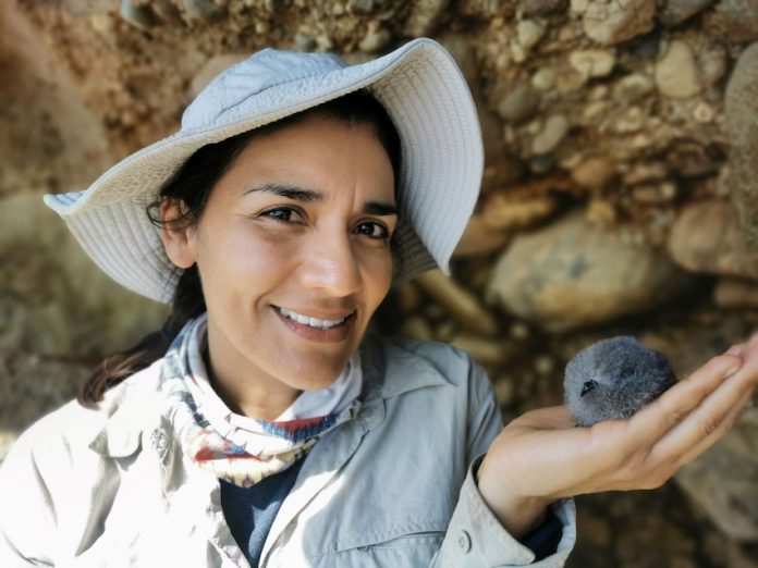 Yuliana Bedolla holding a chick