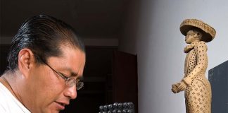 Sculptor Carlomagno Pedro working in his studio.