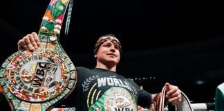 Canelo holds up his championships belts v John Ryder