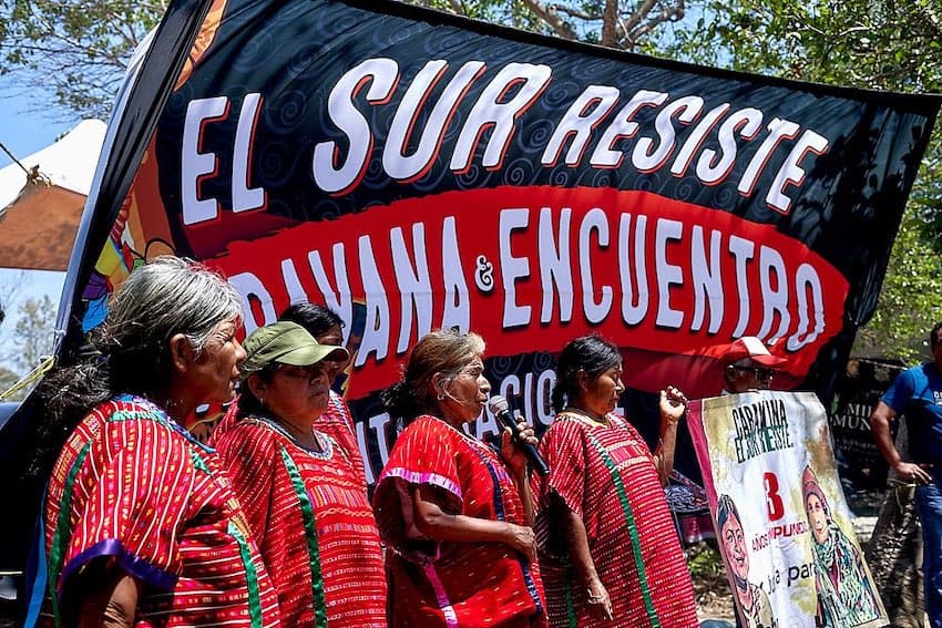 Banners protesting the Maya Train