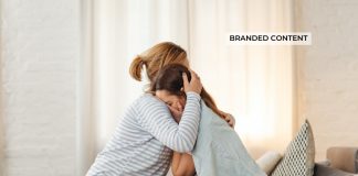 Woman comforting another woman