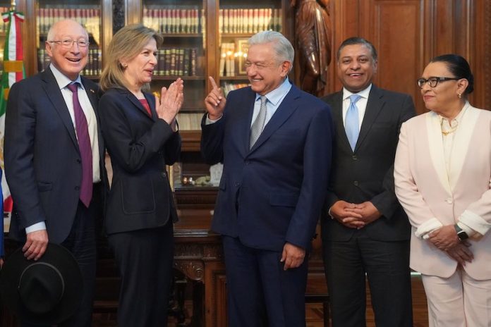 Mexico's President Lopez Obrador, center, with members of US and Mexican government delegation on border security.