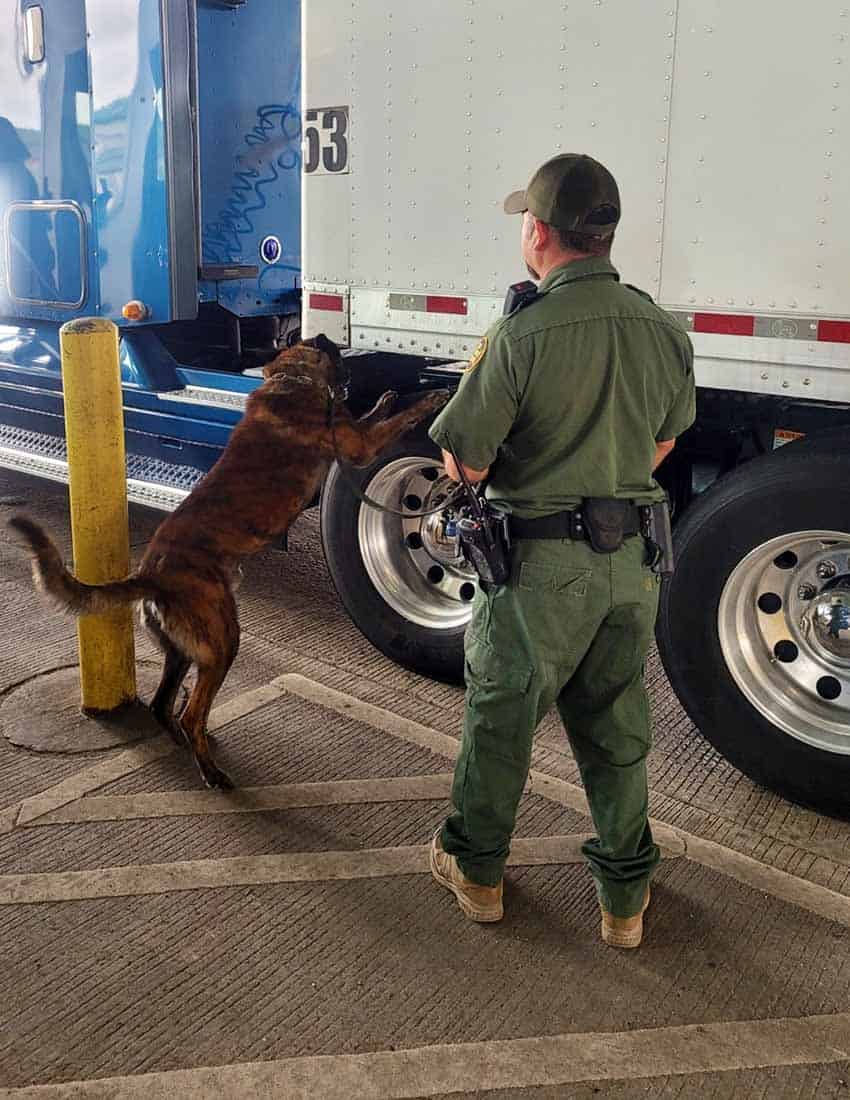 CBP inspecting truck at U.S.-Mexico border in April 2023