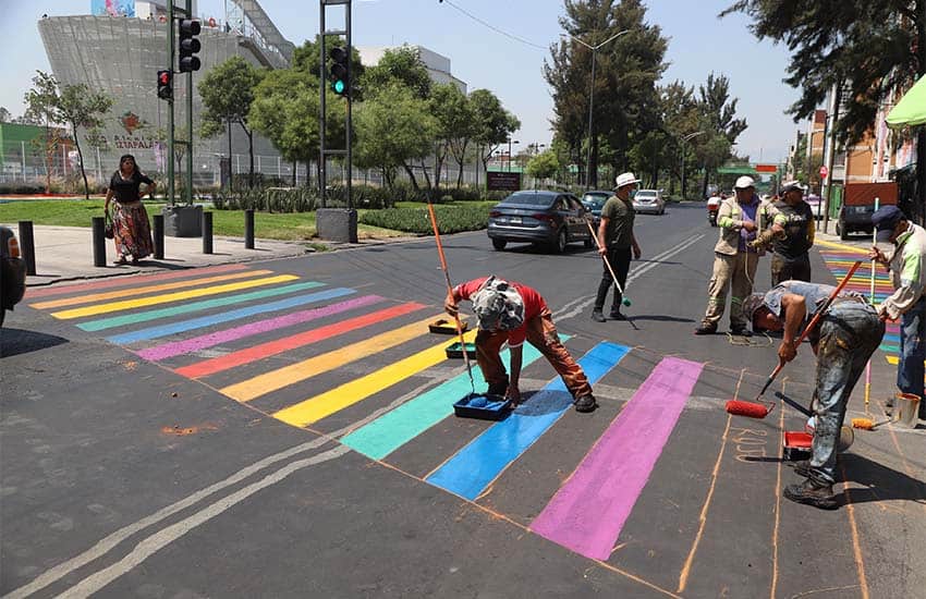 Workers paint crosswalk for LGBTQ+ diversity in Mexico City