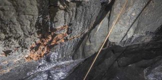 Abbe Hamilton rappelling into the remote La Grieta section of Sistema Huautla.