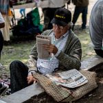 Man reading a newspaper