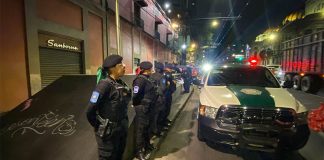 Police guarding crime scene near Bellas Artes Metro station in Mexico City