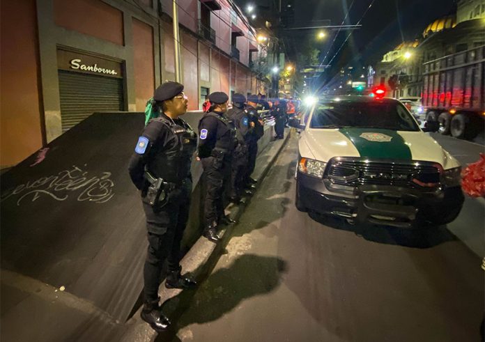 Police guarding crime scene near Bellas Artes Metro station in Mexico City