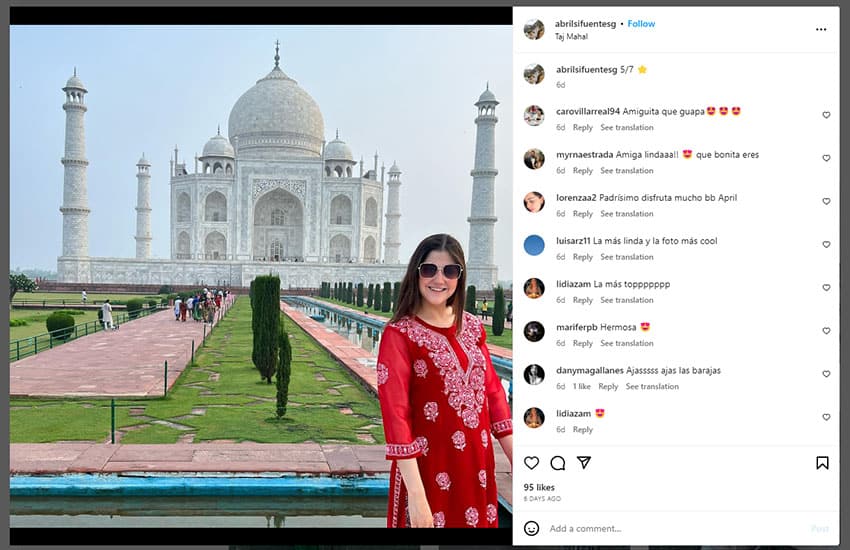 Instagram post of woman standing in front of Taj Mahal