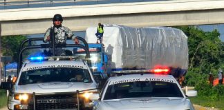 National Guard officers in patrol cars