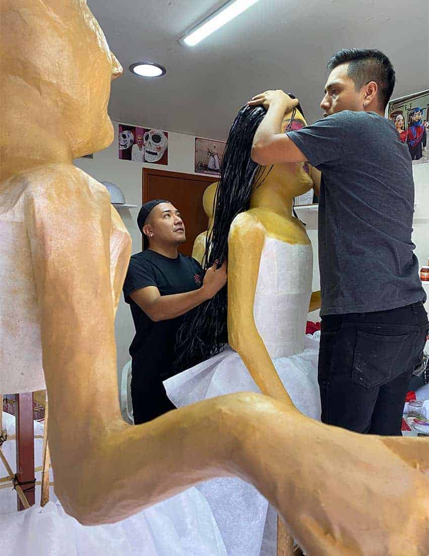 Preparing papier mache figures for the 2023 Guelaguetza in Oaxaca