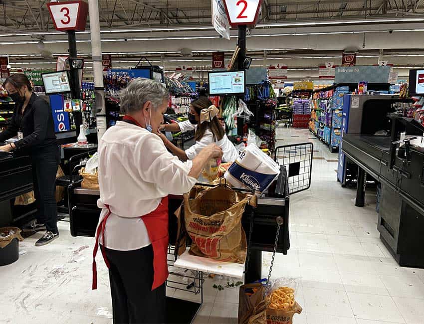 Woman working in a Mexican supermarket