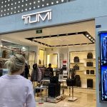 Woman looking at items in a store at CDMC