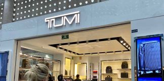 Woman looking at items in a store at CDMC