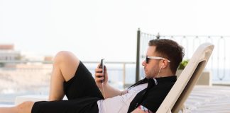 Man working by the pool
