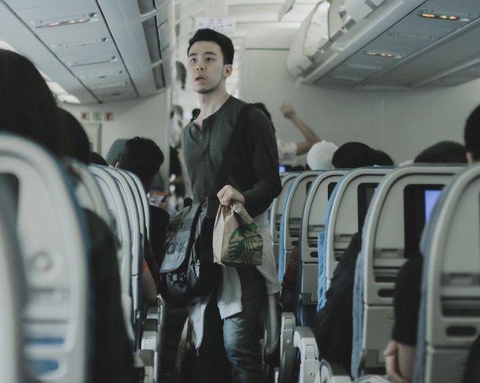 Man in plane cabin
